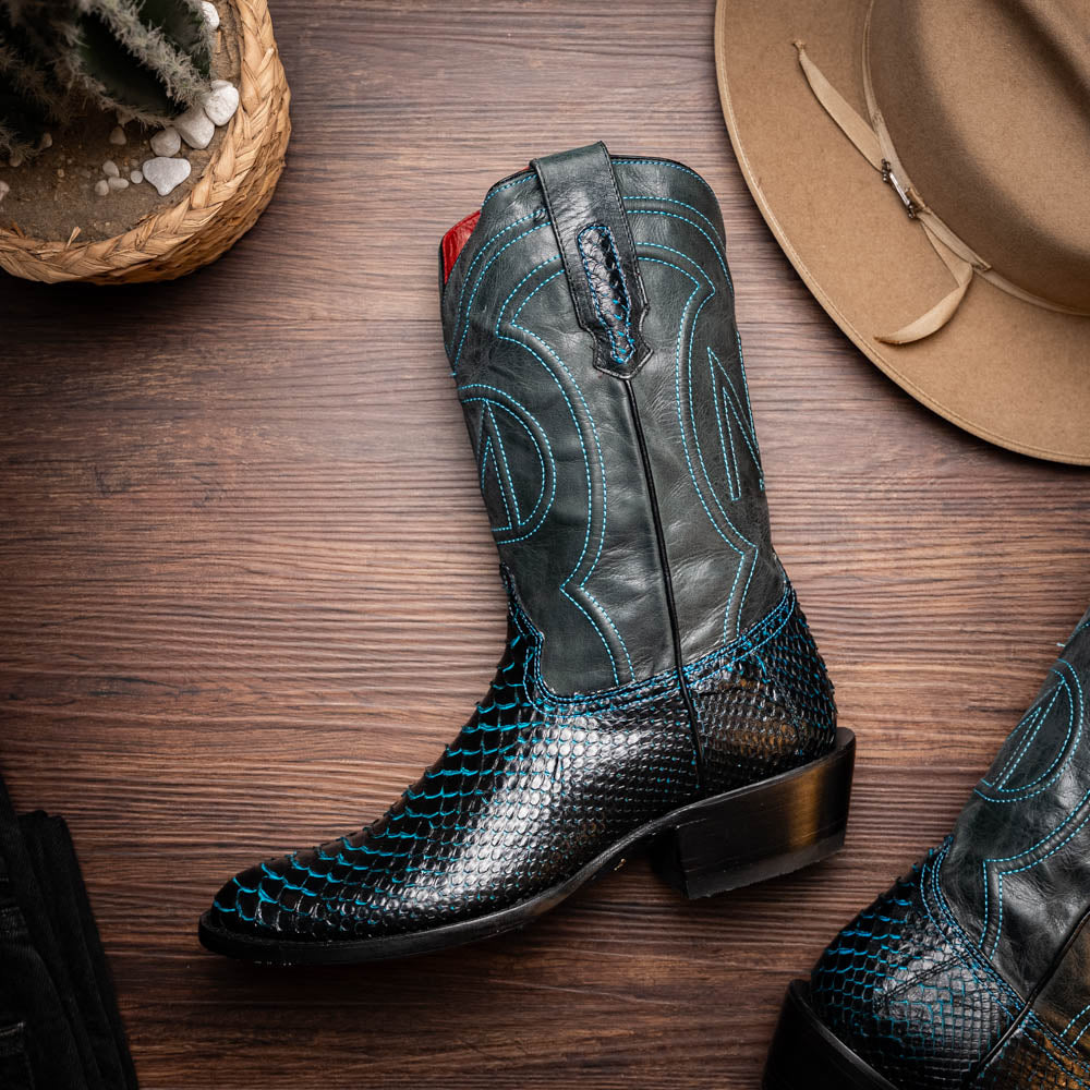 The Marco Di Milano Kansas Black / Blue boots feature black leather with blue stitching, a snakeskin texture, and branded soles—a luxurious handcrafted pair designed to stand out.