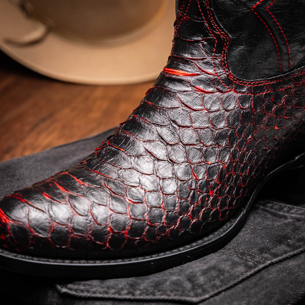 The Kansas BlackCherry boots by Marco Di Milano feature black and red textured python scales, red stitching, and branded soles—crafted as genuine python western boots for a bold statement.