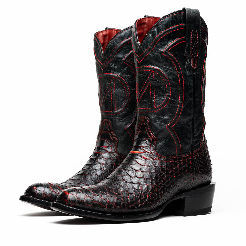 The Kansas BlackCherry boots by Marco Di Milano feature black and red textured python scales, red stitching, and branded soles—crafted as genuine python western boots for a bold statement.