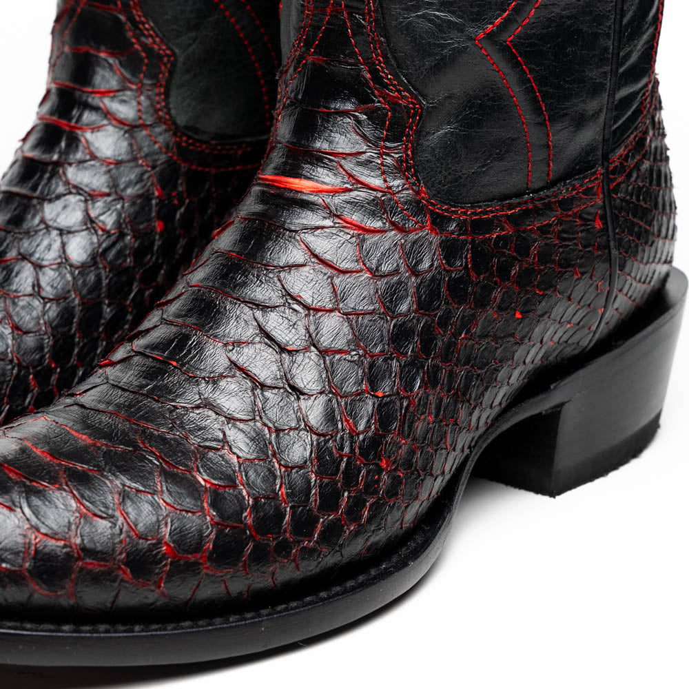The Kansas BlackCherry boots by Marco Di Milano feature black and red textured python scales, red stitching, and branded soles—crafted as genuine python western boots for a bold statement.