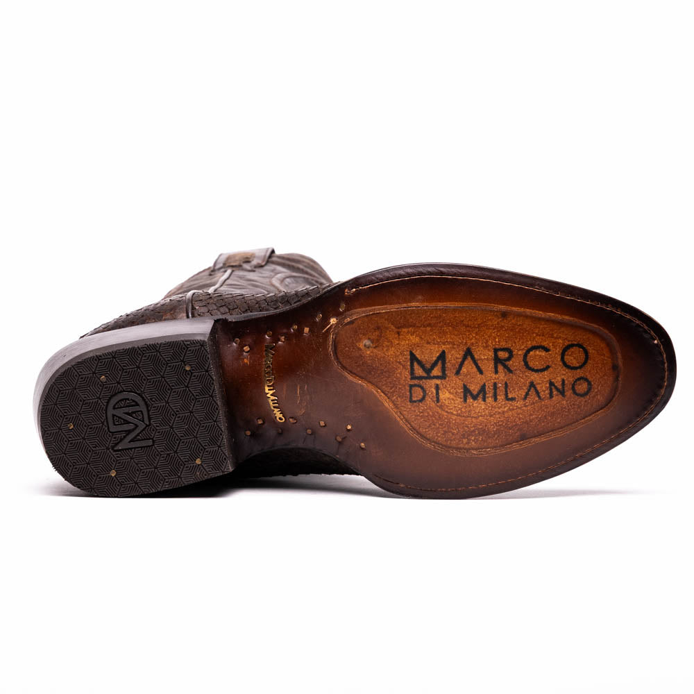 A pair of Kansas Brown textured luxury western boots by Marco Di Milano, featuring a pointed toe—one boot upright, the other showing the brand's logo on the leather sole.