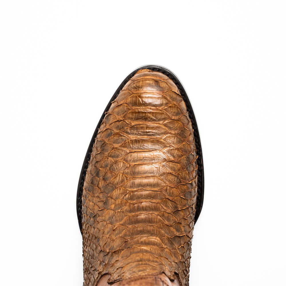A pair of Kansas Cognac cowboy boots by Marco Di Milano in brown genuine python skin, featuring textured scales—one boot upright, the other showing the branded sole.