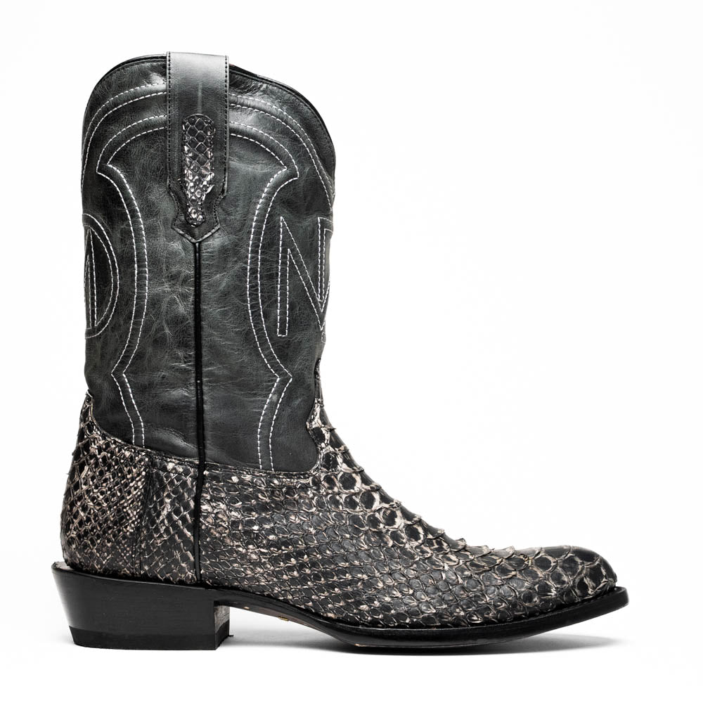 A pair of Kansas Stone White Western cowboy boots by Marco Di Milano, featuring textured, snakeskin-like leather and decorative stitching; one boot stands upright, the other shows the branded sole.