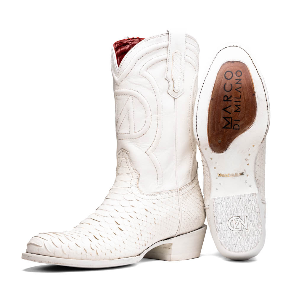 A pair of Kansas White cowboy boots by Marco Di Milano in white textured python skin with pointed toes and low heels; one boot stands upright while the other shows the branded sole.