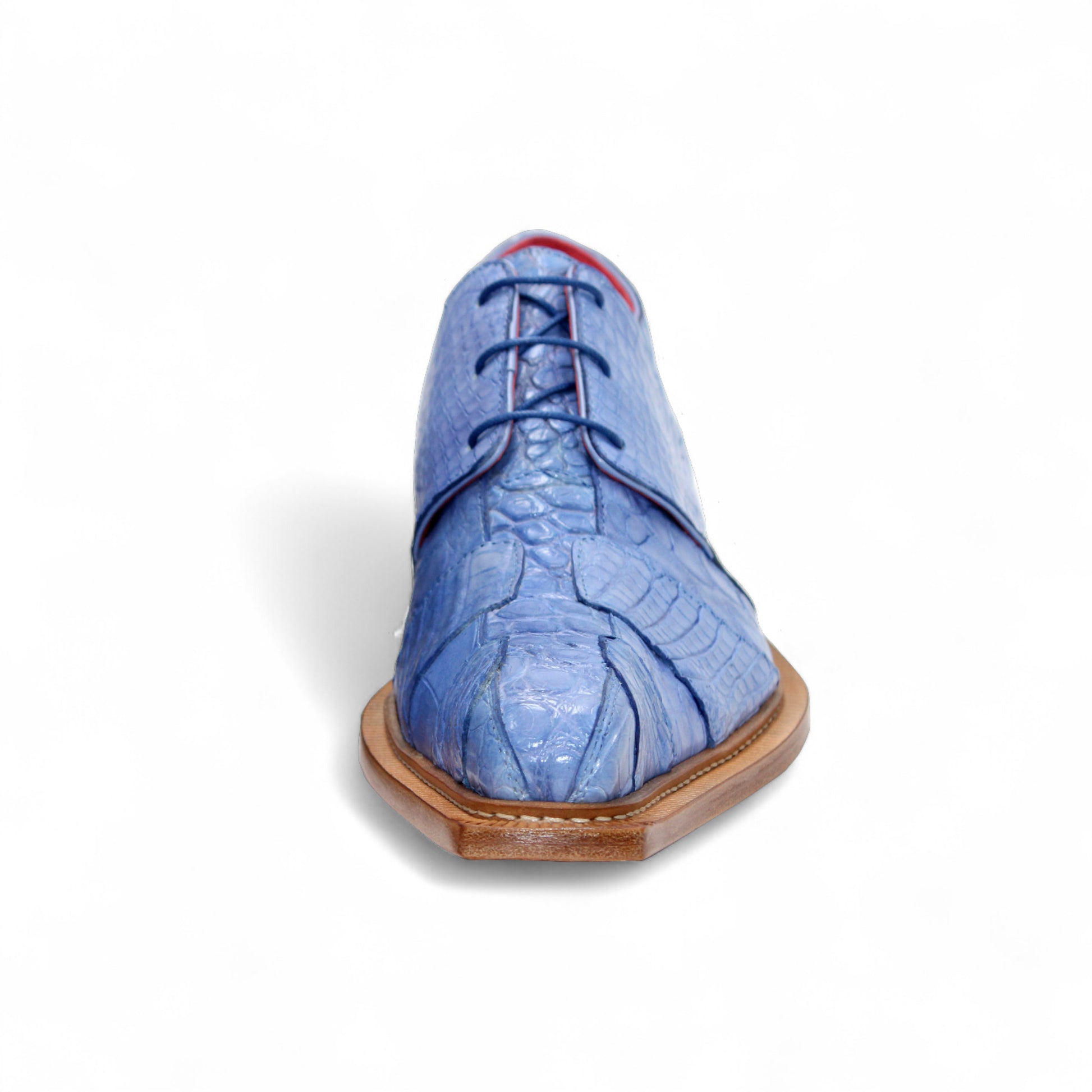 The Fennix Kingston Light Blue by Fennix of Italy is a stylish genuine alligator leather shoe with Italian craftsmanship and a wooden sole, shown from the side on a white background.