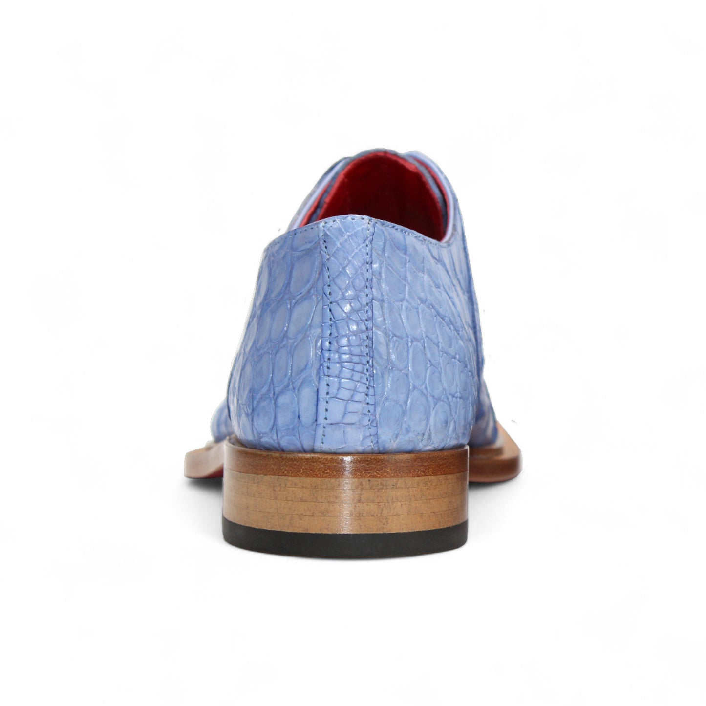 The Fennix Kingston Light Blue by Fennix of Italy is a stylish genuine alligator leather shoe with Italian craftsmanship and a wooden sole, shown from the side on a white background.