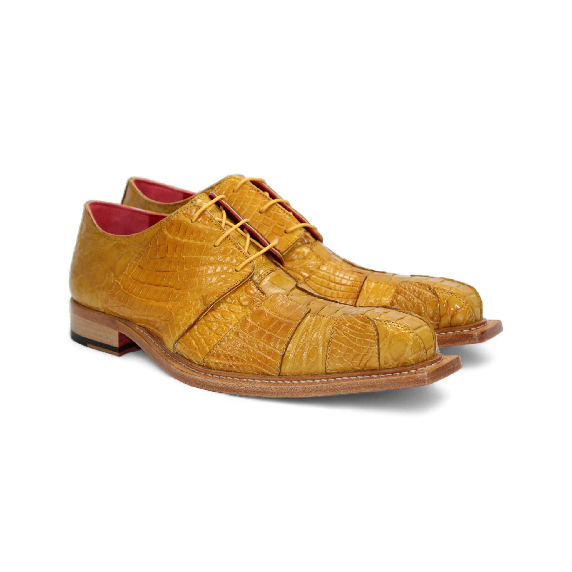 The Fennix Kingston Yellow by Fennix of Italy is a luxury men's dress shoe in yellow genuine alligator leather, with a brown sole, red inner lining, and lace-up closure. Shown in side profile on a white background, it showcases Italian craftsmanship.