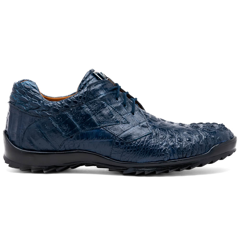 The Kratos Navy by Marco Di Milano: blue hand-painted crocodile-patterned leather dress shoes with black rubber soles—one upright, the other propped—a true statement of luxury footwear.