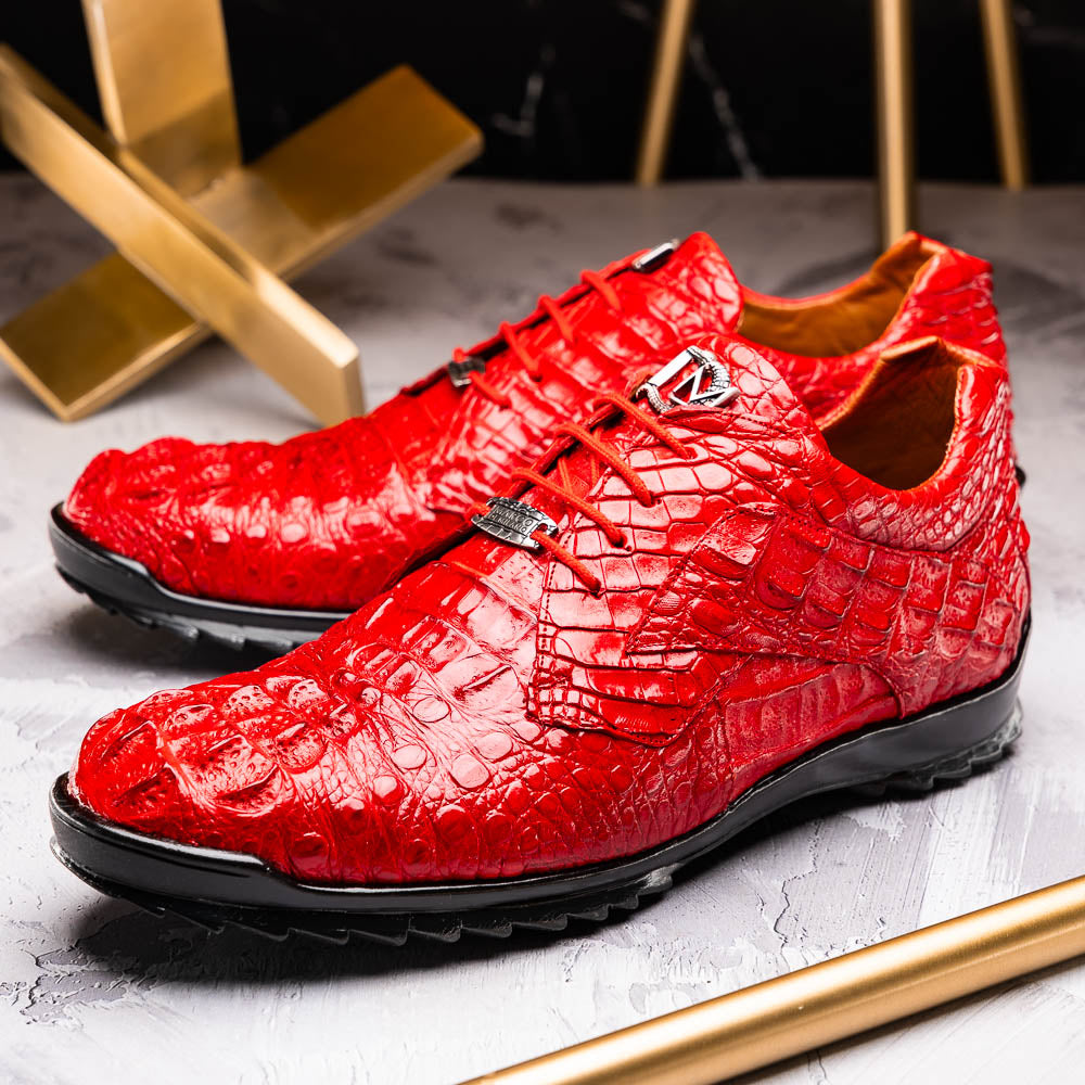 The Kratos Red by Marco Di Milano: luxury red crocodile-pattern leather dress shoes with black soles; one shoe stands upright while the other displays its polished sole.