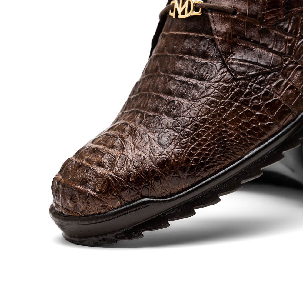 The Kratos Brown by Marco Di Milano features genuine caiman crocodile leather, a hand-painted brown finish, black soles, and gold lace accents—ideal luxury dress shoes for the discerning wearer.