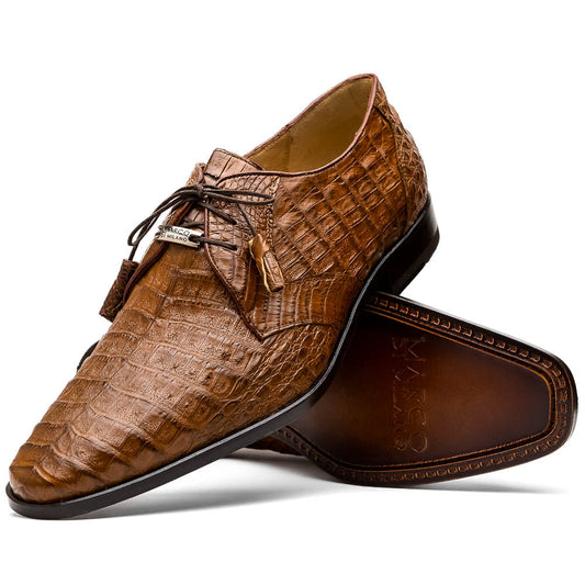 A pair of Marco Di Milano Lacio Bay Apache luxury derby shoes crafted from genuine caiman crocodile leather—one upright and the other on its side to showcase the exquisite sole.