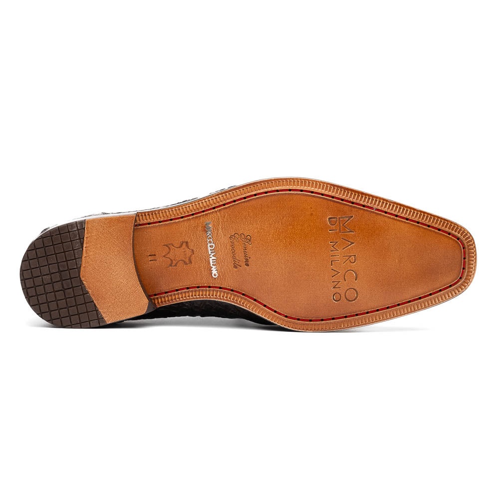 A pair of Marco Di Milano Lacio Brandy luxury derby shoes in a brown crocodile pattern, crafted from genuine caiman leather—one upright and one on its side to highlight the signature sole branding.