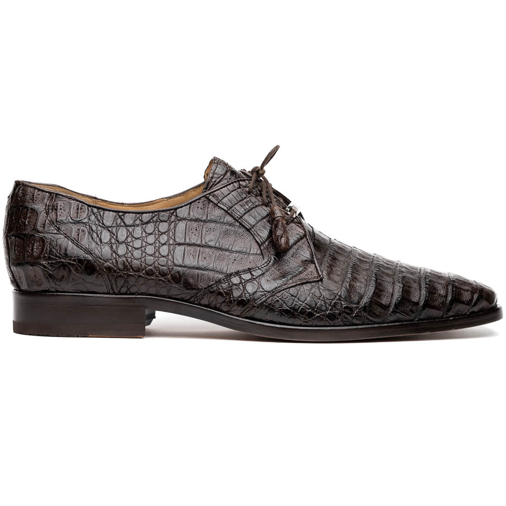 The "Lacio Brown" by Marco Di Milano is a luxury men's dress shoe made from genuine caiman crocodile leather, featuring tassel laces and the brand's logo—presented with one shoe resting atop the other.