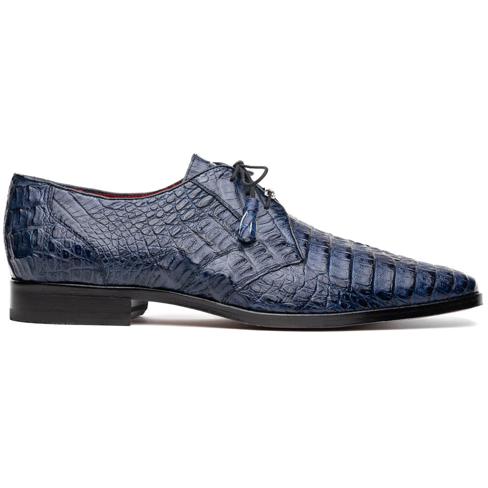 The Lacio Navy by Marco Di Milano are luxury dress derby shoes made from genuine caiman crocodile leather, featuring elegant tassels, a red interior lining, and tan leather soles stamped with the brand’s name.