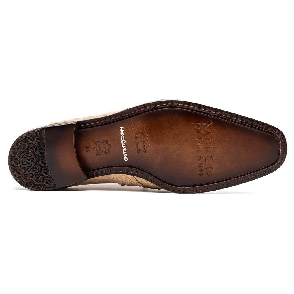 A pair of beige Marco Di Milano Lacio Orix shoes in genuine caiman crocodile, featuring a luxury derby design with dark brown laces—one upright, the other on its side to display the detailed sole.