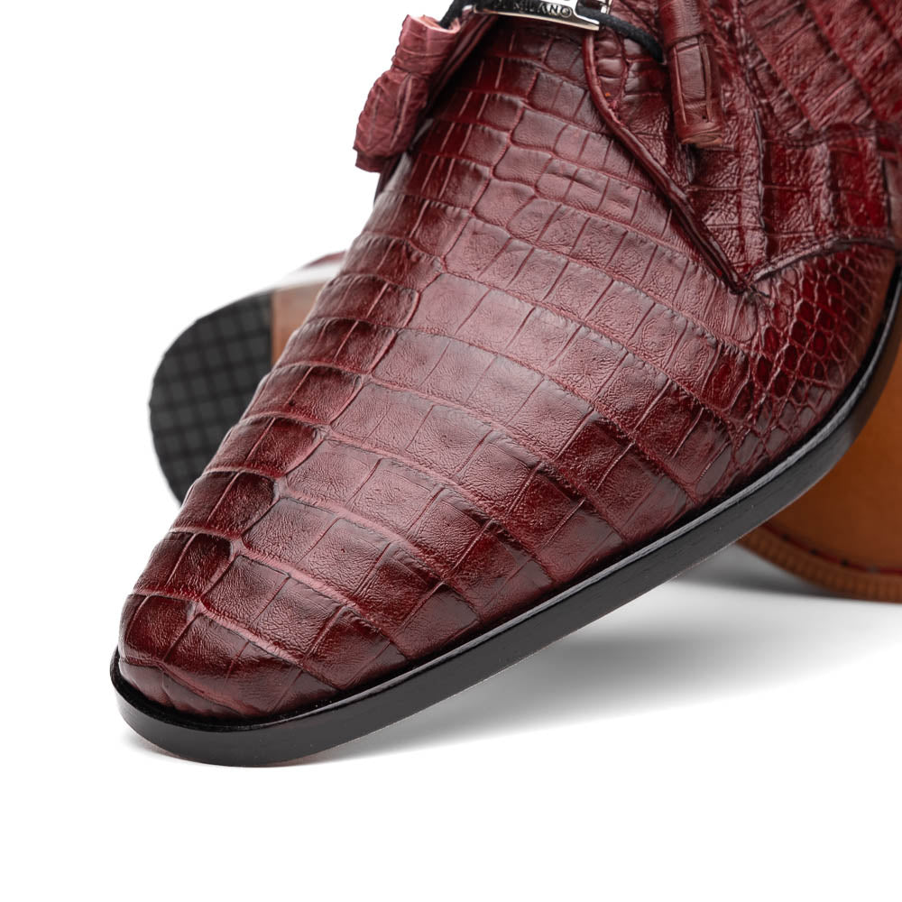 The Lacio Wine by Marco Di Milano is a luxury men's dress shoe crafted from brown genuine caiman crocodile leather, featuring a red inner lining, black laces, and "Marco Di Milano" branding on the tan leather sole.