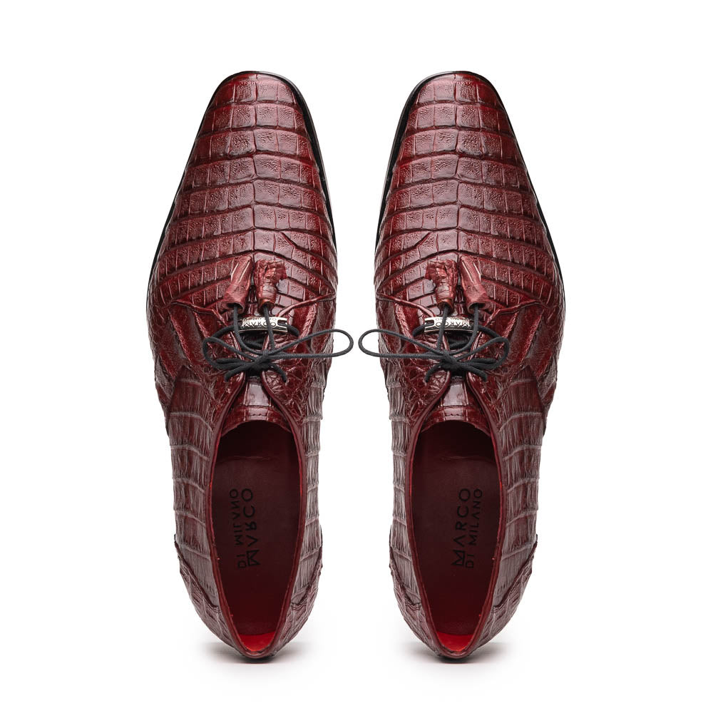 The Lacio Wine by Marco Di Milano is a luxury men's dress shoe crafted from brown genuine caiman crocodile leather, featuring a red inner lining, black laces, and "Marco Di Milano" branding on the tan leather sole.