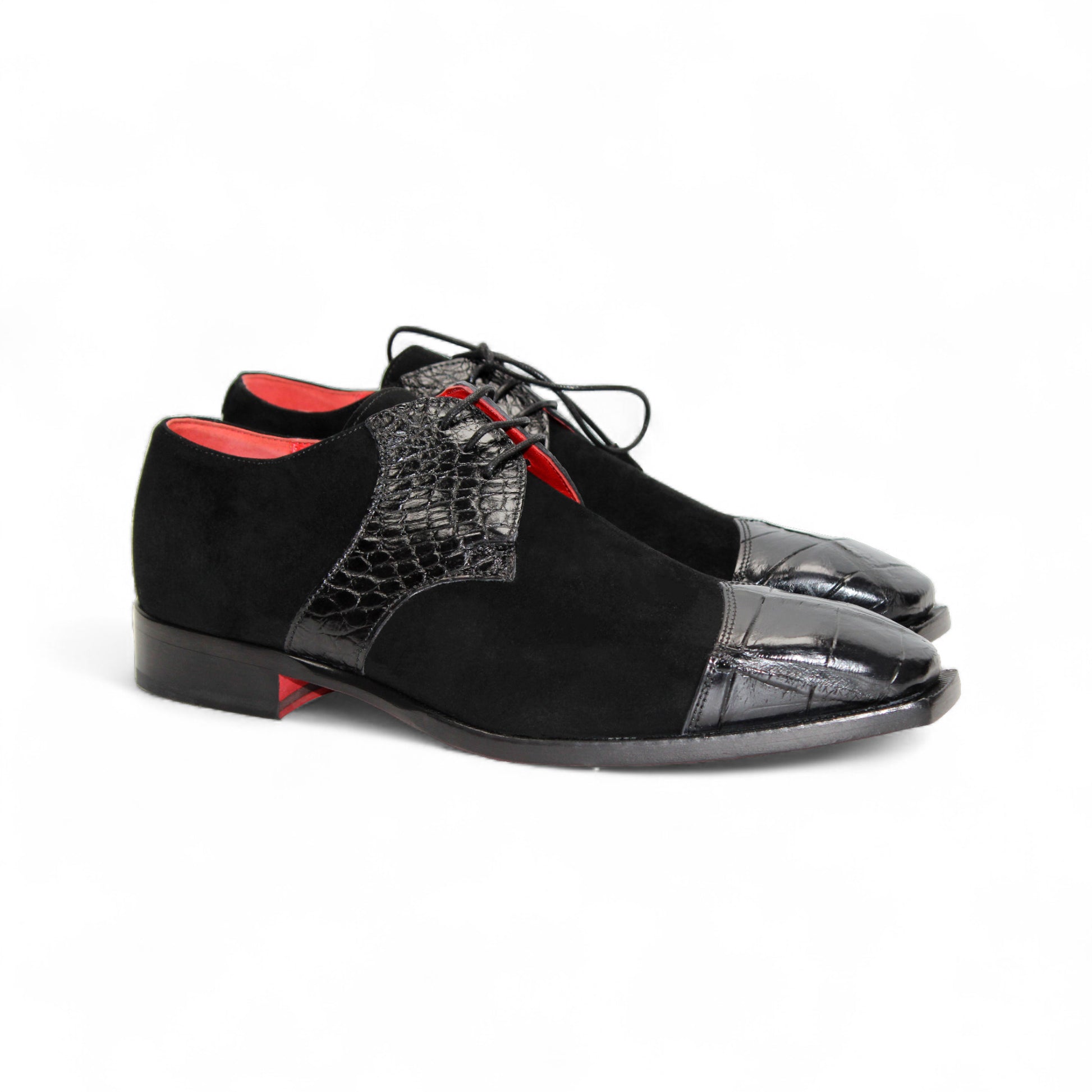 The Fennix Landon Black by Fennix of Italy is a black dress shoe with a suede body, textured leather upper and toe, red lining, and low heel—inspired by Italian craftsmanship for luxury men's footwear enthusiasts.