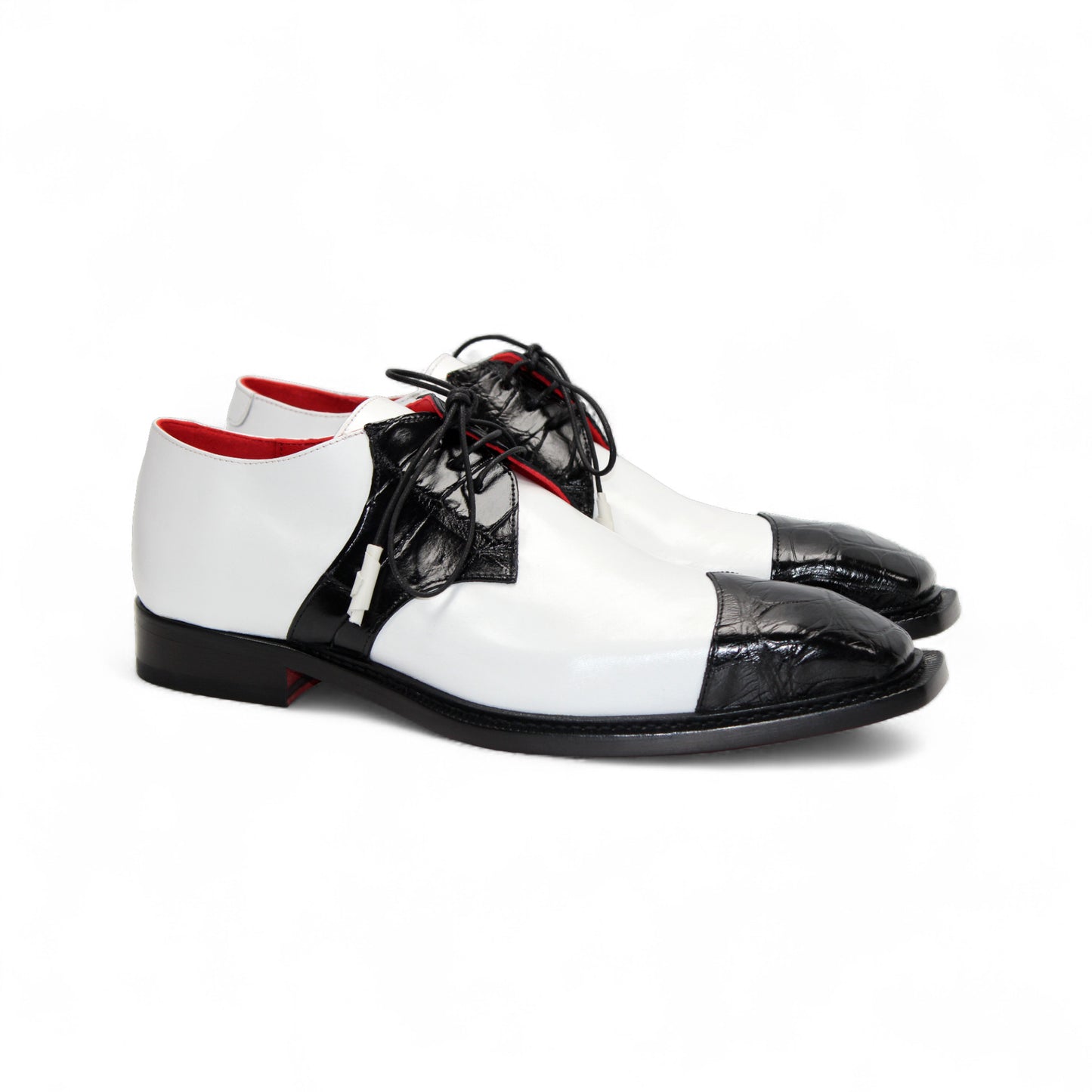 The Fennix of Italy Landon 2 Black/White is a luxury leather oxford with laces, a pointed toe, and low heel—an elegant display of Italian craftsmanship set against a white background.