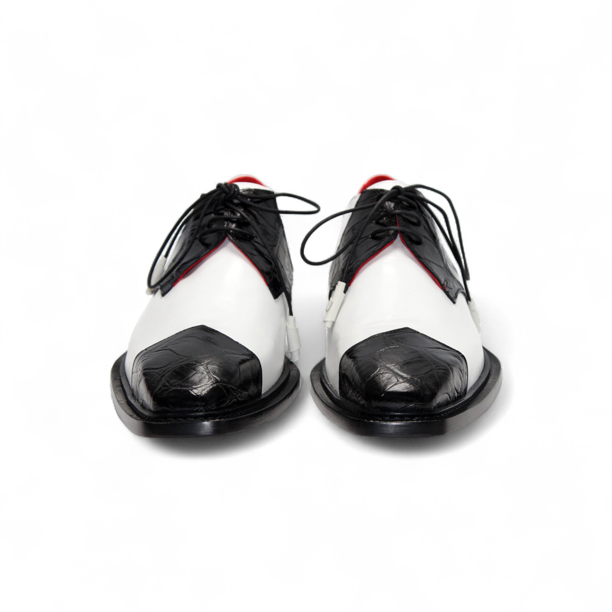 The Fennix of Italy Landon 2 Black/White is a luxury leather oxford with laces, a pointed toe, and low heel—an elegant display of Italian craftsmanship set against a white background.