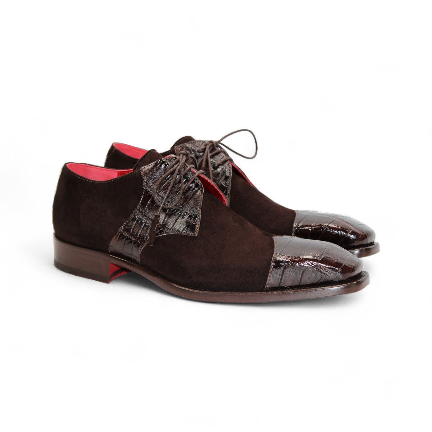 The Fennix of Italy Fennix Landon Chocolate is a dark brown luxury suede dress shoe with leather accents, laces, and a low heel, shown in side profile against a white background—ideal for those seeking elegant footwear.