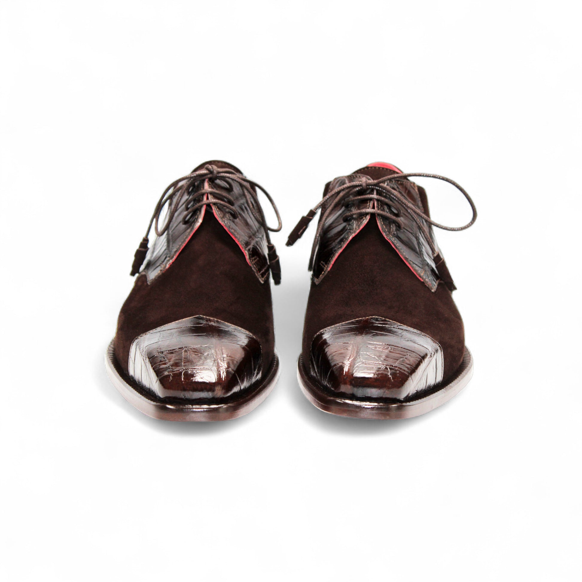 The Fennix of Italy Fennix Landon Chocolate is a dark brown luxury suede dress shoe with leather accents, laces, and a low heel, shown in side profile against a white background—ideal for those seeking elegant footwear.