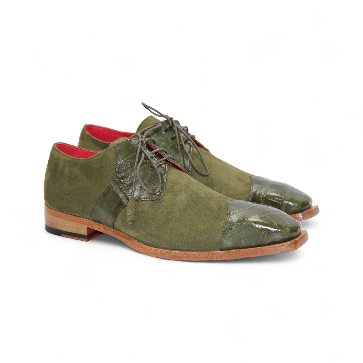 The Fennix Landon Olive by Fennix of Italy is a single olive green dress shoe in suede and leather with laces and a wooden sole, highlighting Italian craftsmanship against a white background.