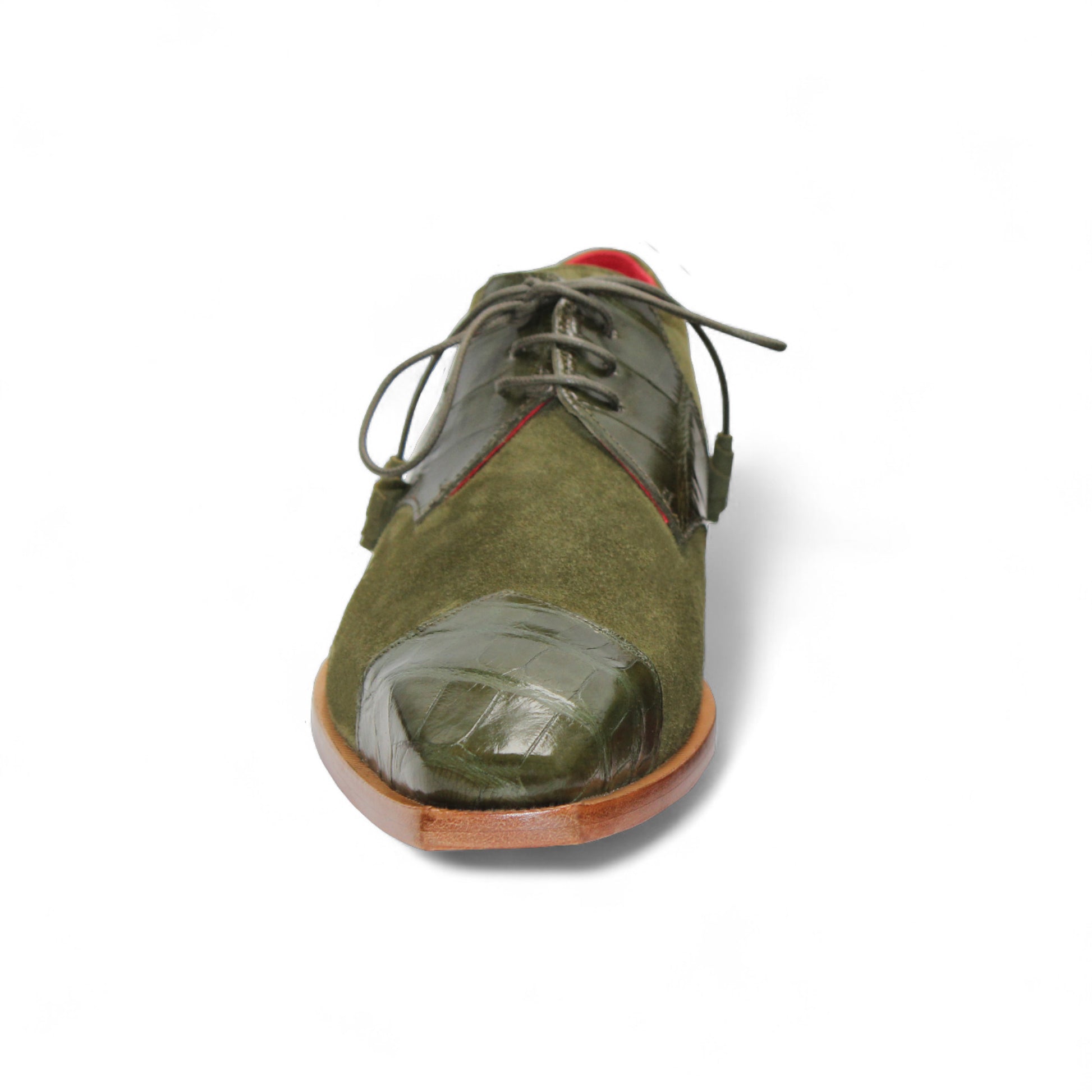 The Fennix Landon Olive by Fennix of Italy is a single olive green dress shoe in suede and leather with laces and a wooden sole, highlighting Italian craftsmanship against a white background.