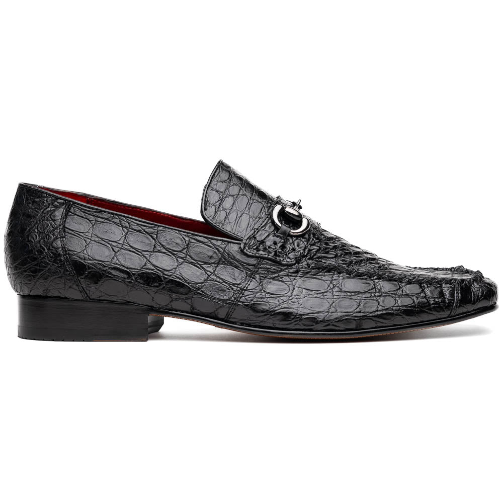 A pair of Marco Di Milano Landro Black crocodile-pattern luxury loafers with metal bit detail: one shoe stands upright, the other lies on its side displaying the tan sole labeled "Marco Di Milano.