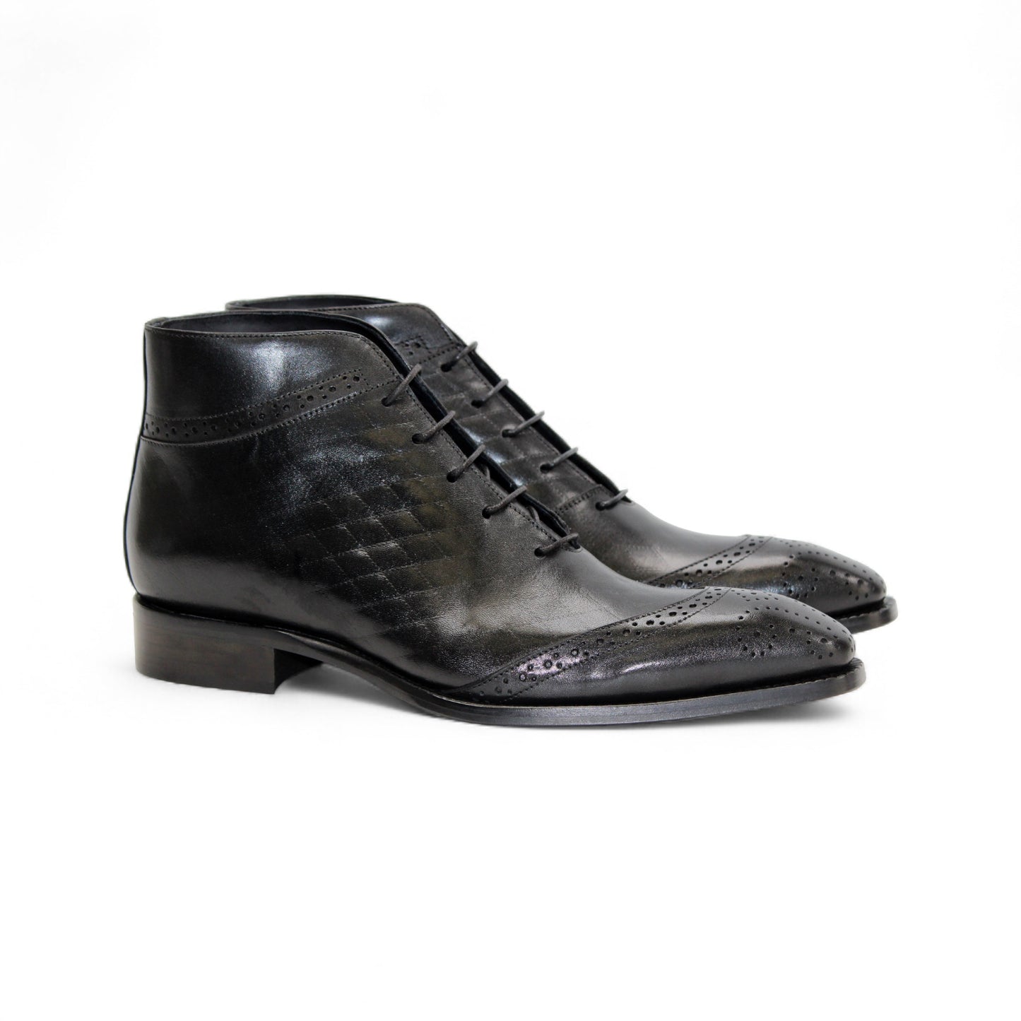 The Duca Di Matiste Duca Lauro Black is an Italian leather dress boot with laces, brogue toe detailing, and a low heel, showcased against a plain white background.