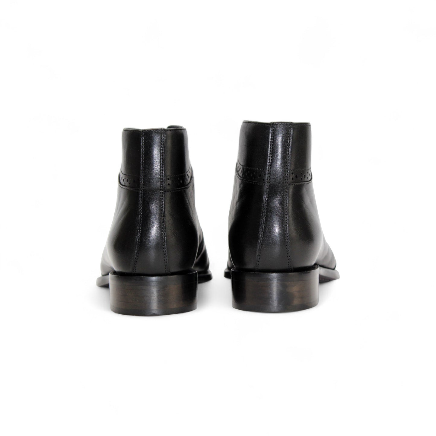 The Duca Di Matiste Duca Lauro Black is an Italian leather dress boot with laces, brogue toe detailing, and a low heel, showcased against a plain white background.