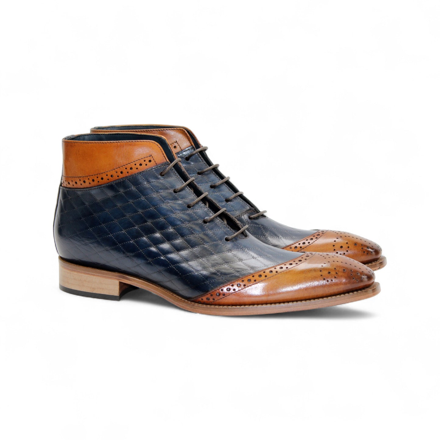 The Duca Lauro Cognac/Navy by Duca Di Matiste is a men's dress shoe featuring a black quilted leather body, brown leather trims, lace-up closure, and wooden sole—crafted in the refined tradition of Italian shoemaking.
