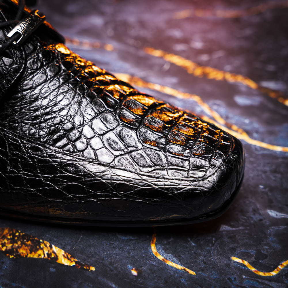 A pair of Marco Di Milano Leonardo Black luxury derby shoes in genuine caiman crocodile leather—one shoe upright, the other showing the tan sole with "Marco di Milano" text.