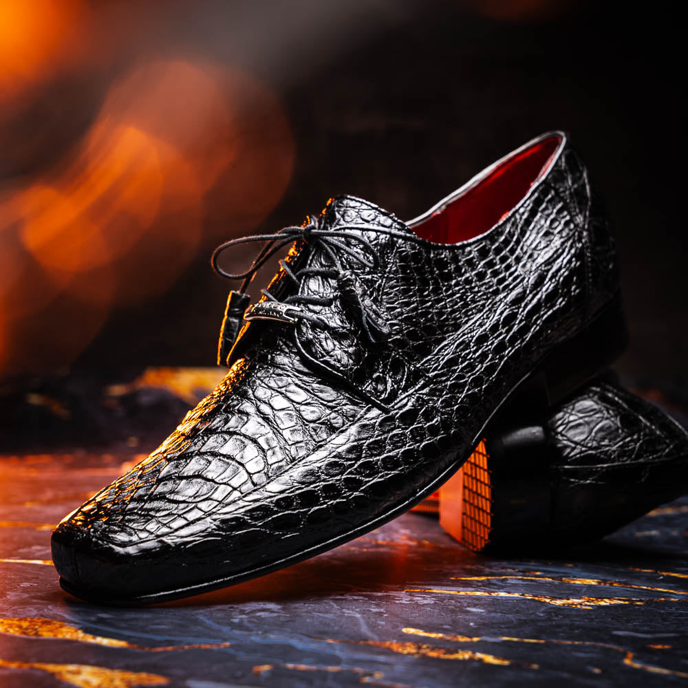 A pair of Marco Di Milano Leonardo Black luxury derby shoes in genuine caiman crocodile leather—one shoe upright, the other showing the tan sole with "Marco di Milano" text.