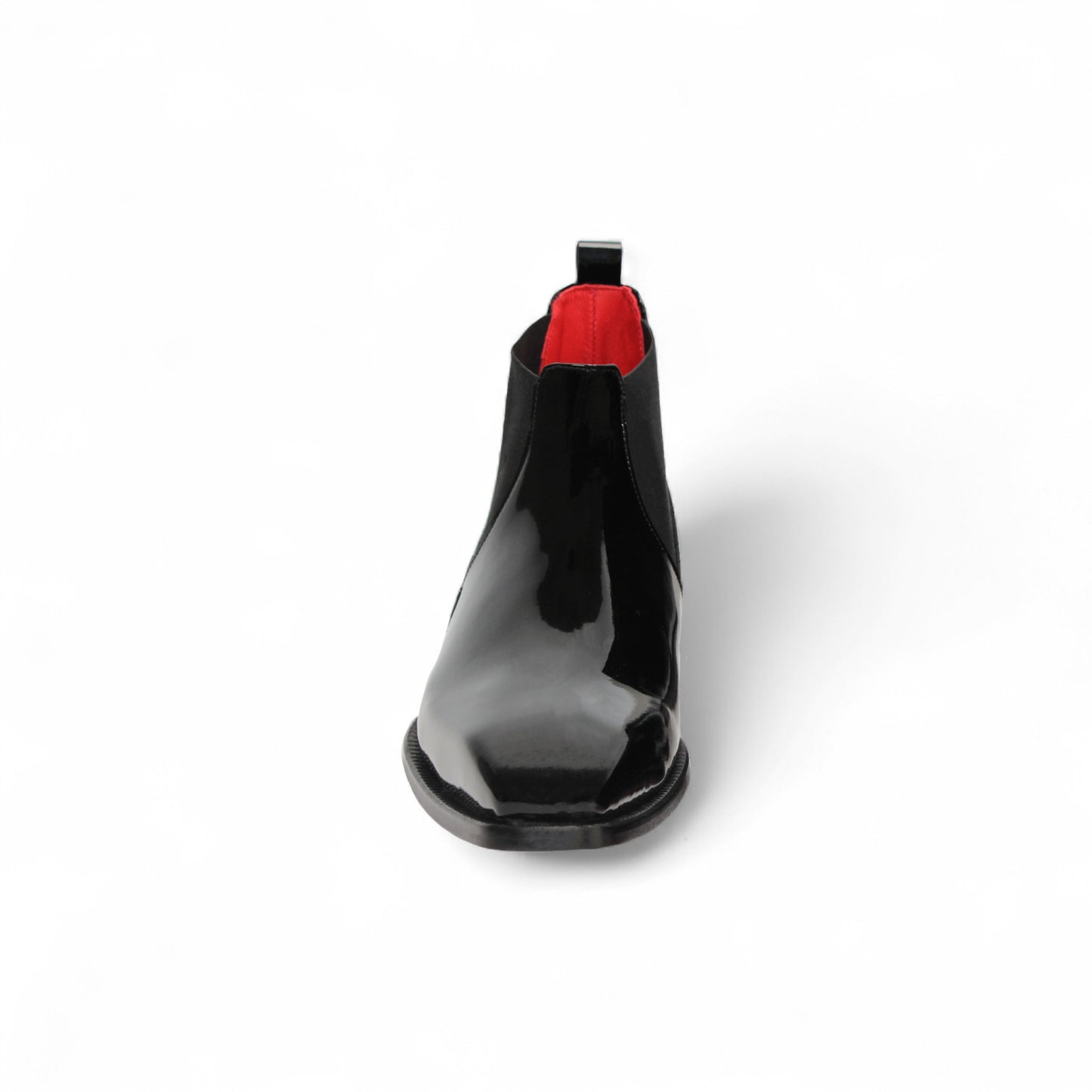 The Emilio Franco Leonardo Black is a polished Italian patent leather Chelsea boot with an elastic side panel and low heel, shown in profile against a white background—classic elegance from Emilio Franco.