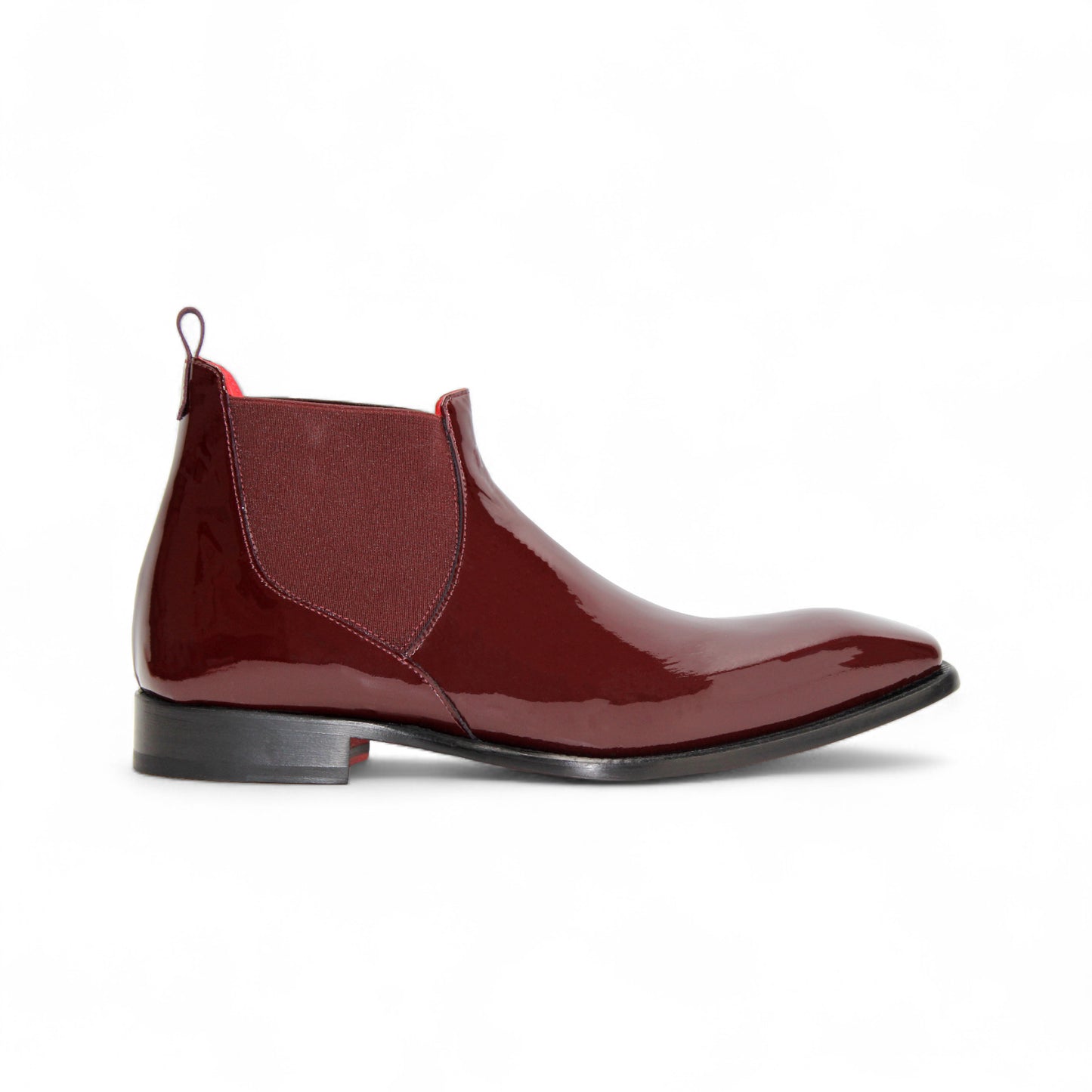The Emilio Franco Leonardo Burgundy is a shiny Chelsea boot with Italian craftsmanship, a low black heel, and elastic side panels, photographed on a white background.