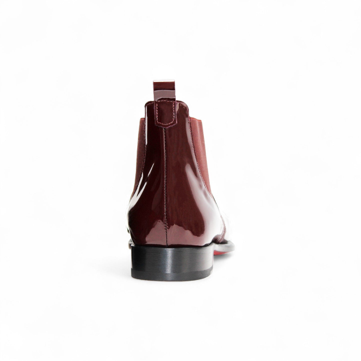 The Emilio Franco Leonardo Burgundy is a shiny Chelsea boot with Italian craftsmanship, a low black heel, and elastic side panels, photographed on a white background.