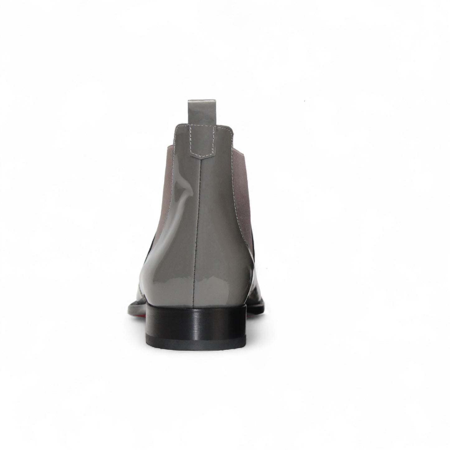 The Emilio Franco Leonardo Grey is a glossy Italian patent leather Chelsea boot with side elastic panels, low black heel, and red accents on the pull tab and lining—luxury formal footwear by Emilio Franco, shown on a white background.