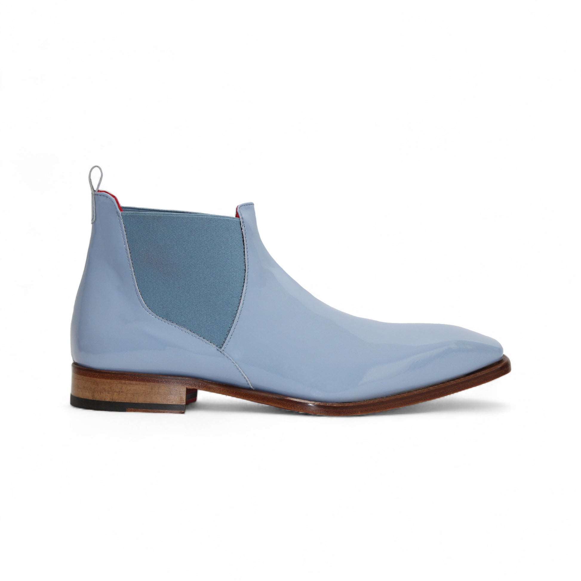 The Emilio Franco Leonardo Light Blue is a men's Italian patent leather Chelsea boot with elastic side panels, a leather sole, and pull tab, shown in profile on a white background—a stylish dress shoe by Emilio Franco.