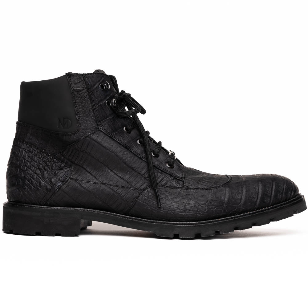 The Leoni Oil Black boots by Marco Di Milano feature genuine caiman leather in a crocodile texture, black laces, and rugged rubber soles—luxurious footwear with striking details.