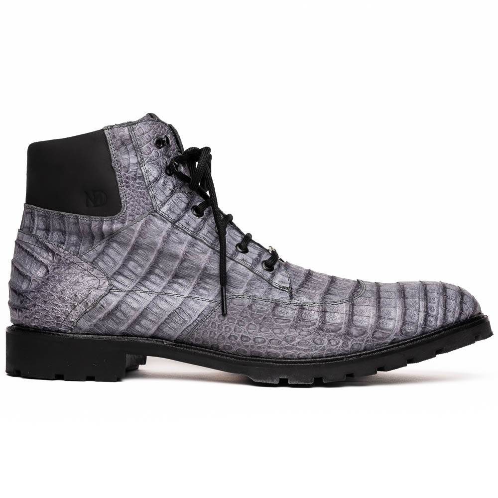 The Leoni Oil Gray boot by Marco Di Milano features a gray, crocodile-patterned design in genuine caiman leather with black laces, a thick rugged sole, and hand-painted finishes—all showcased on a white background.