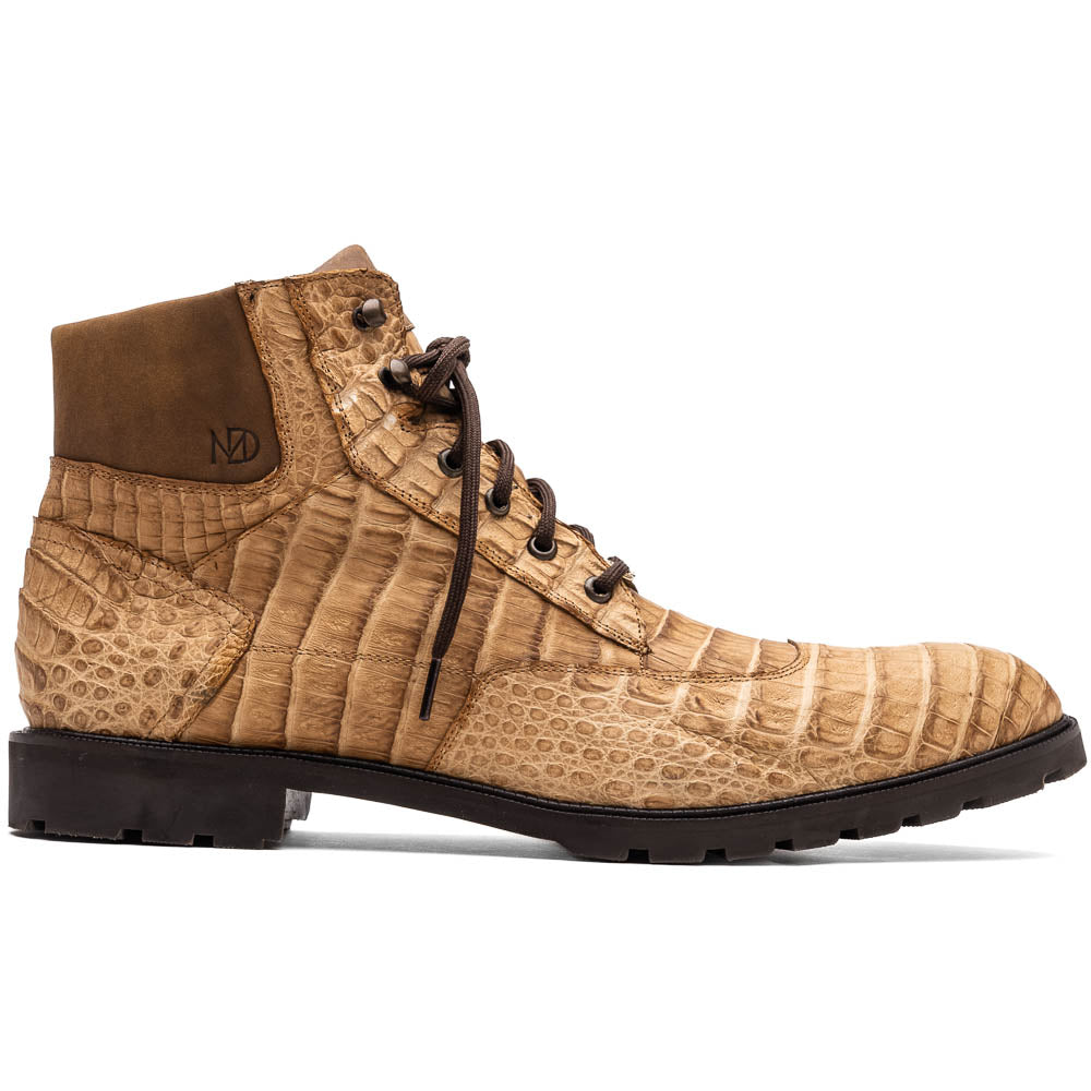 The Leoni Oil Orix by Marco Di Milano features tan crocodile-patterned leather lace-up boots with brown rubber soles, showcased upright and sideways to highlight the tread—a refined choice in luxury men's footwear.