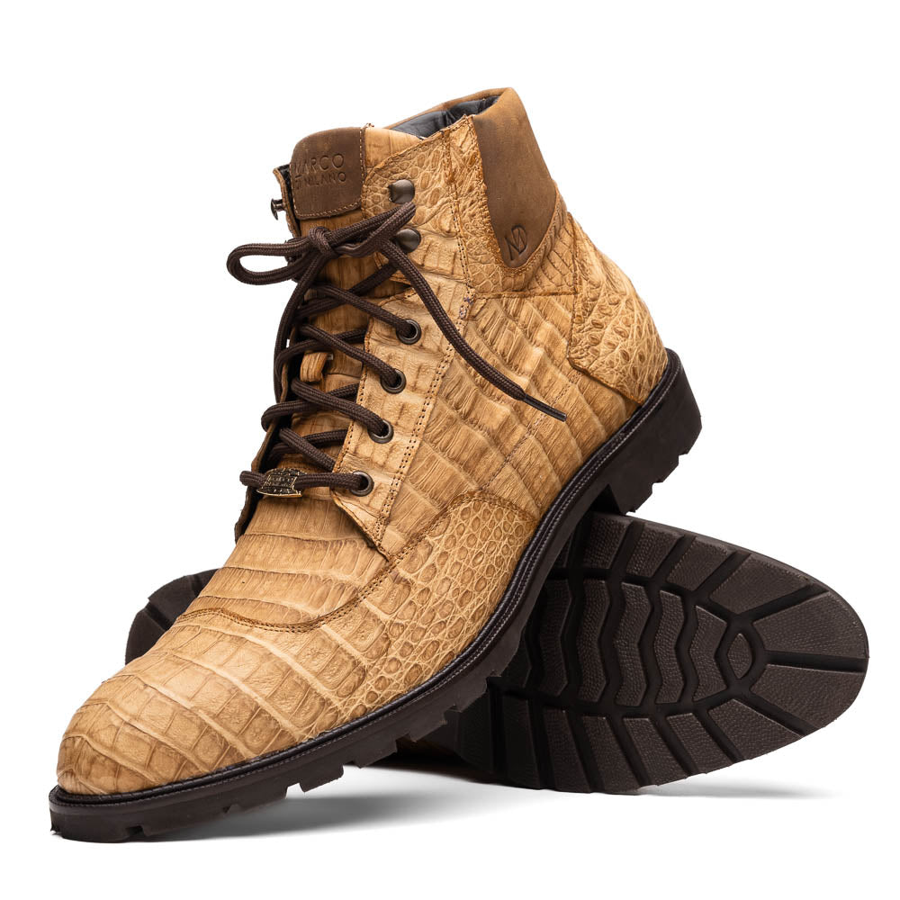 The Leoni Oil Orix by Marco Di Milano features tan crocodile-patterned leather lace-up boots with brown rubber soles, showcased upright and sideways to highlight the tread—a refined choice in luxury men's footwear.