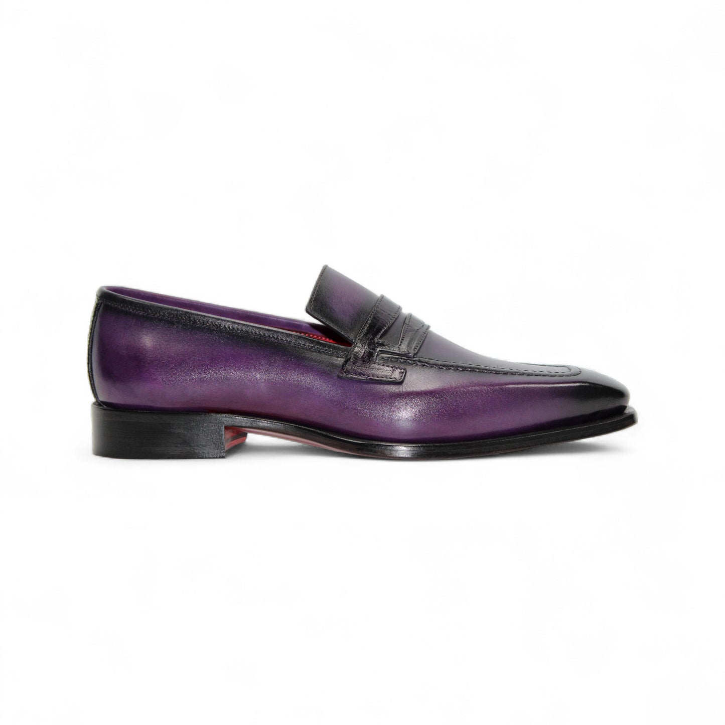 The Fennix of Italy Fennix Liam Purple is a purple leather loafer with a low heel, penny strap, and leather sole crafted in Italy, displayed in profile on a white background.