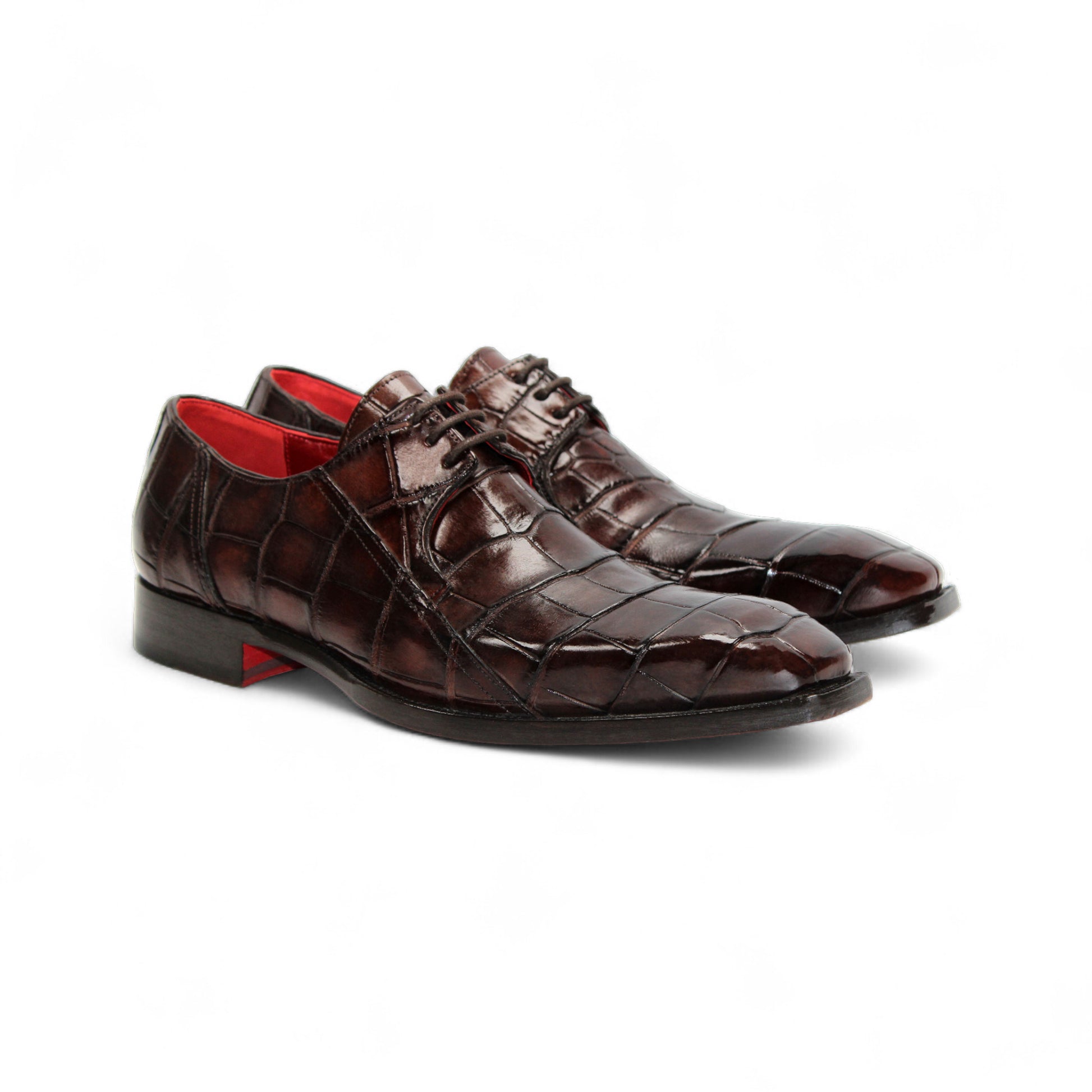 The Fennix of Italy Fennix Logan Chocolate is a luxury men's shoe in dark brown genuine alligator leather with a crocodile pattern, red interior lining, and low heel, displayed in profile on a white background.