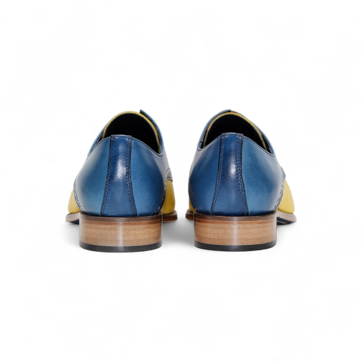 The Duca Di Matiste Duca Lombardi Ocean Blue/Yellow men's dress shoe features genuine leather, color block design in blue and yellow, laces, a wooden sole, and is shown from the side on a white background.
