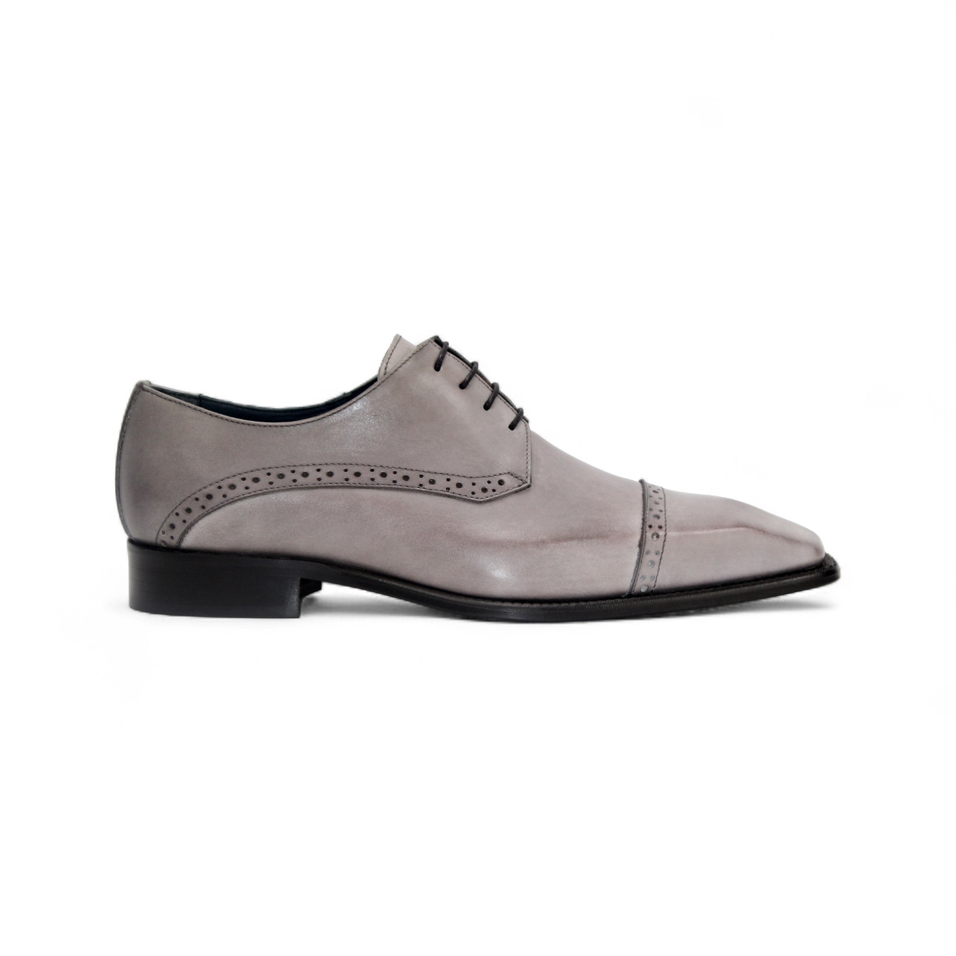The Duca Lombardi Light Grey by Duca Di Matiste is an Italian-made genuine leather dress shoe with black laces, a low heel, and decorative perforations on the side and toe cap, shown against a white background.