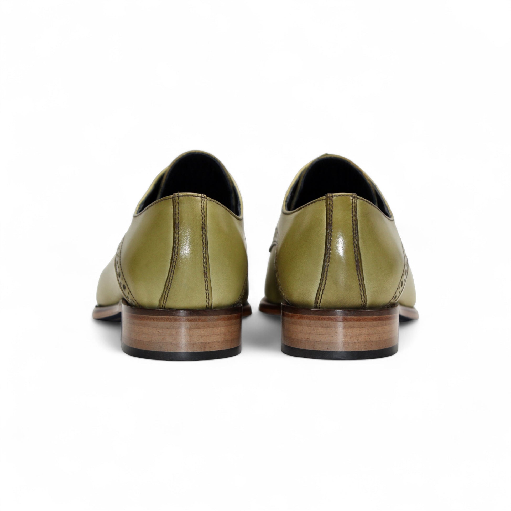 The Duca Lombardi Olive by Duca Di Matiste is a single olive green genuine leather dress shoe with black laces, a brown leather sole, and decorative stitching, shown in profile on a white background.