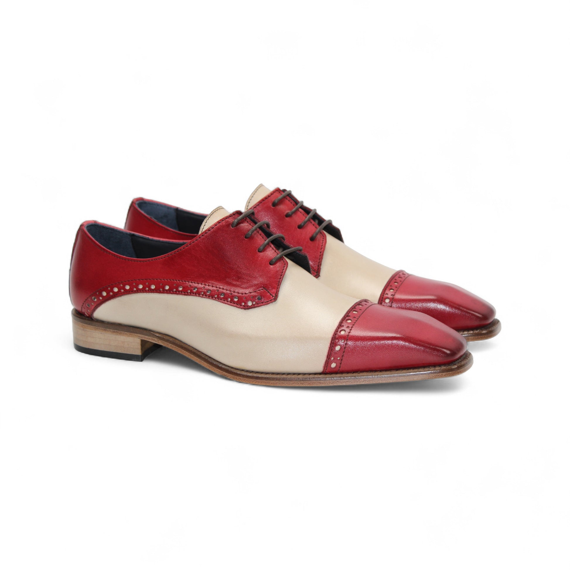 The Duca Di Matiste Lombardi (Red/Beige) is a two-tone oxford by Duca Di Matiste, crafted in Italy from fine leather with a beige body and red accents, brogue detailing, and a low wooden heel.