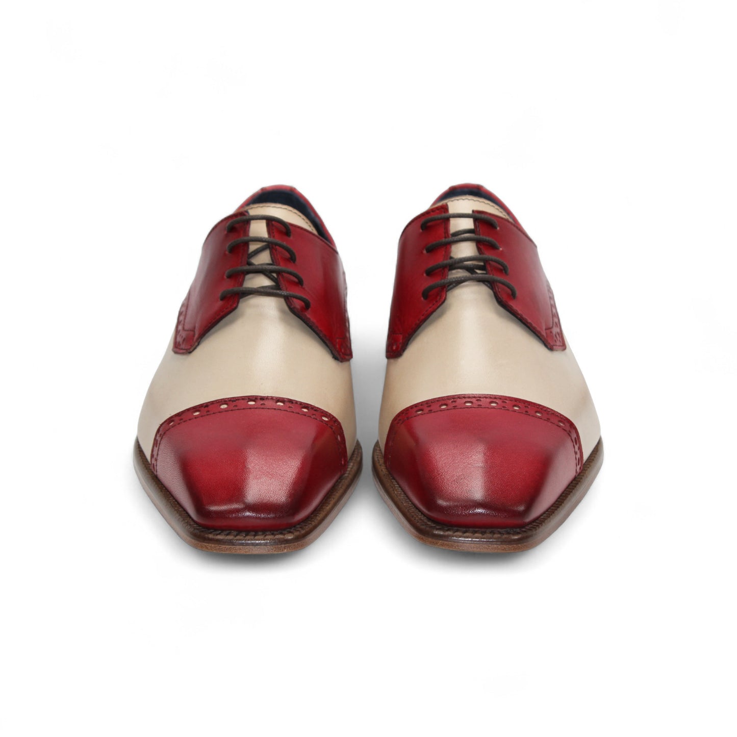 The Duca Di Matiste Lombardi (Red/Beige) is a two-tone oxford by Duca Di Matiste, crafted in Italy from fine leather with a beige body and red accents, brogue detailing, and a low wooden heel.
